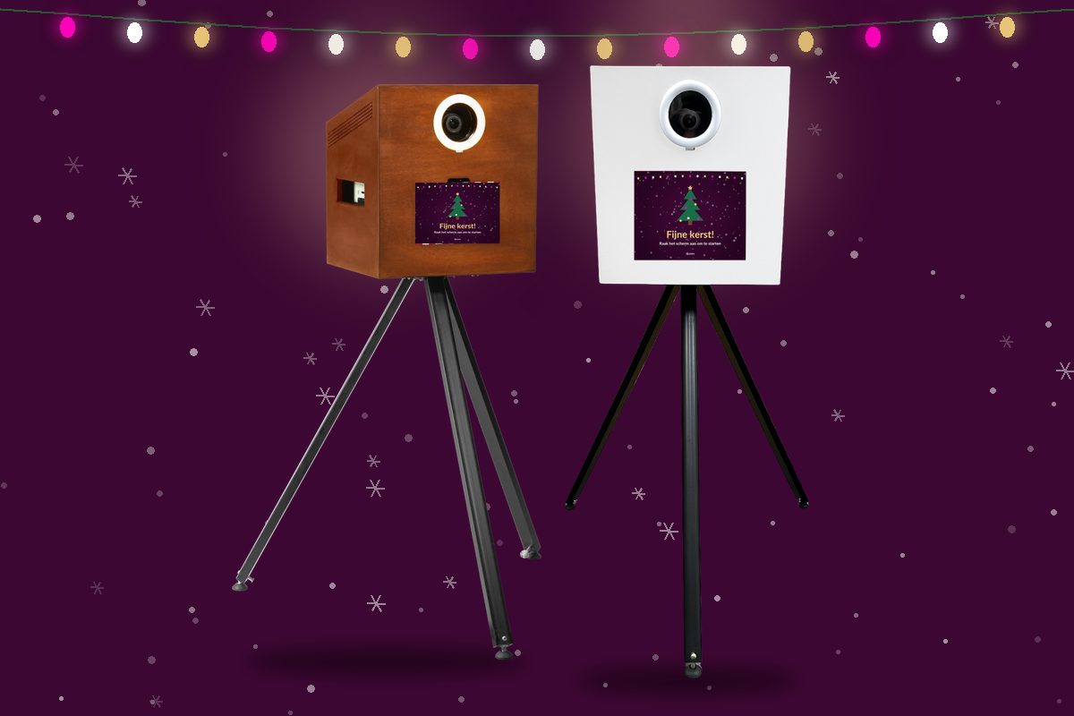 White and wooden photo booth with Christmas start screen